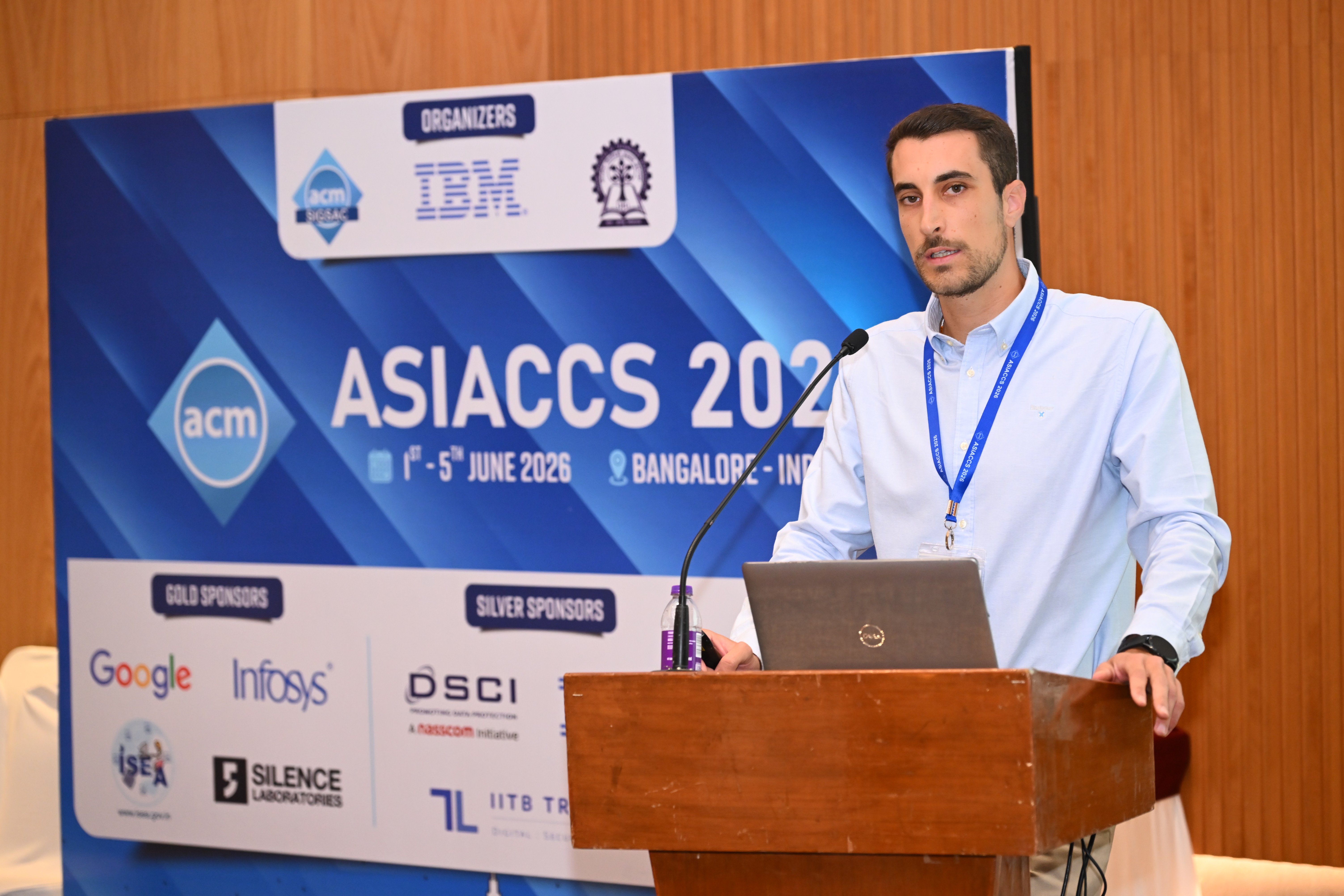 Carlo presenting TAGSHIELD at AsiaCCS 2026